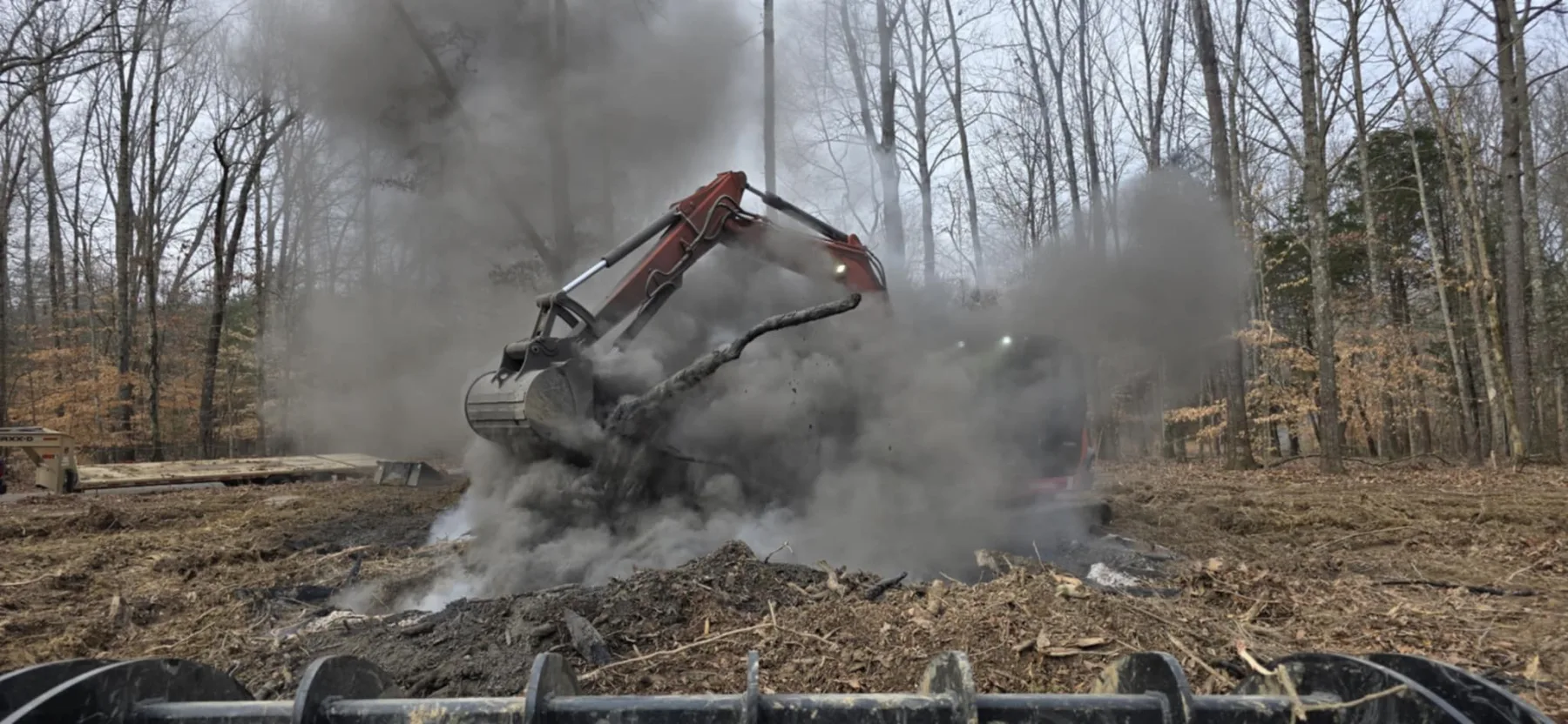 Excavation equipment working on rural property near Beechgrove, Tennessee